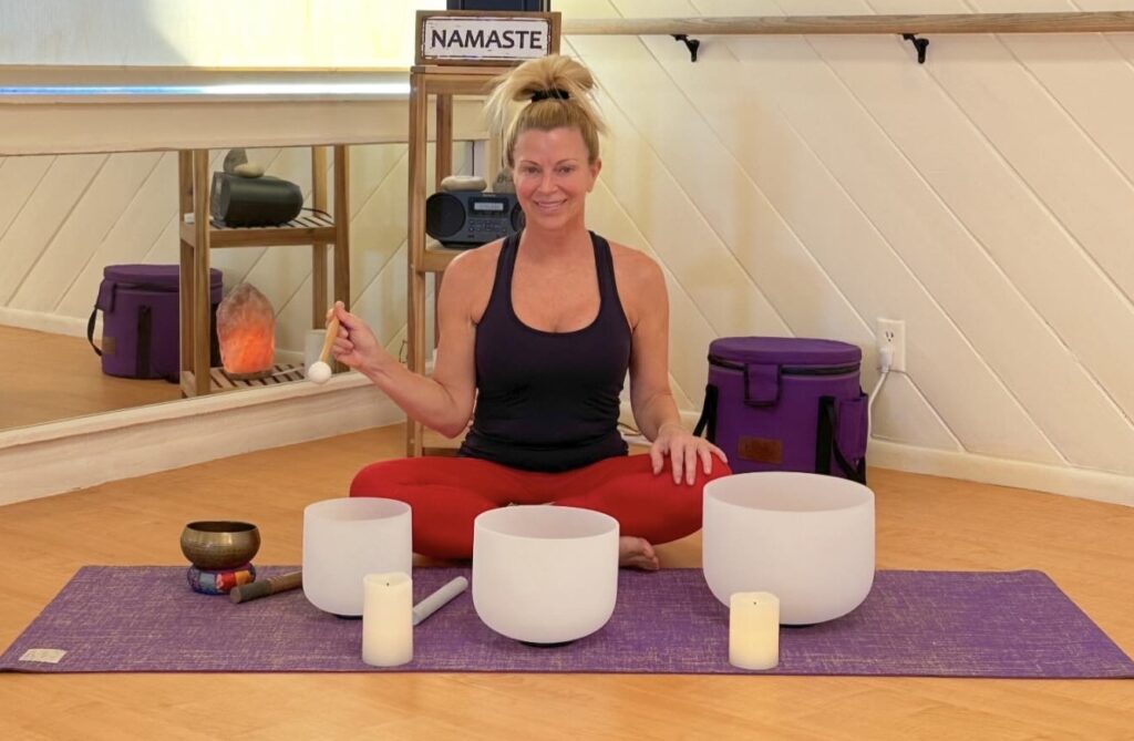 Sound healing session with singing bowls at Bikram Yoga El Paseo Palm Desert.